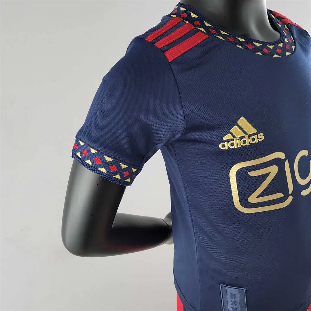 22-23 Ajax away kids kit 9