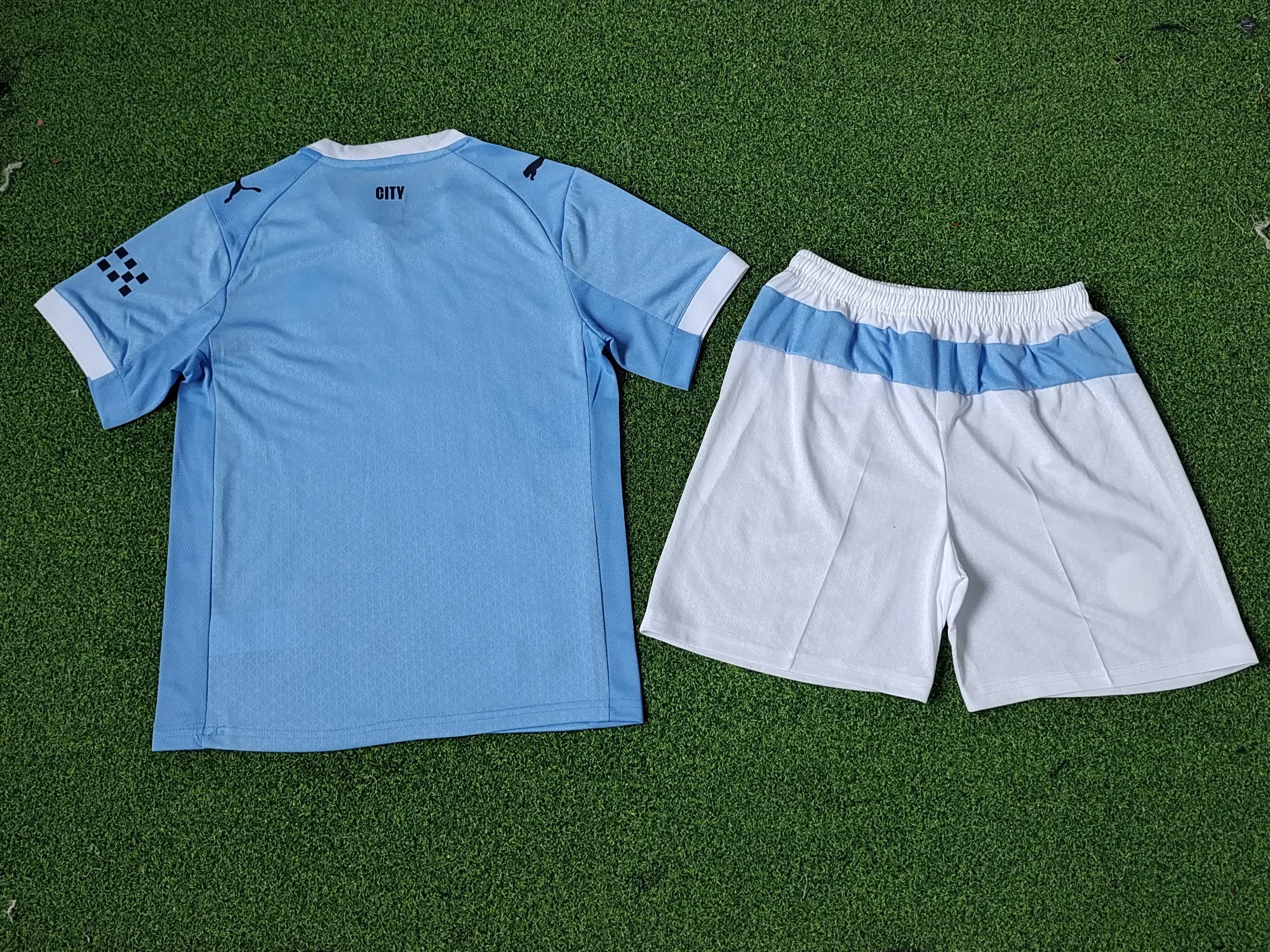25-26 Manchester City Home Player Version Kid Kits Youth Apparels AAAAJersey Supply Yupoo 1