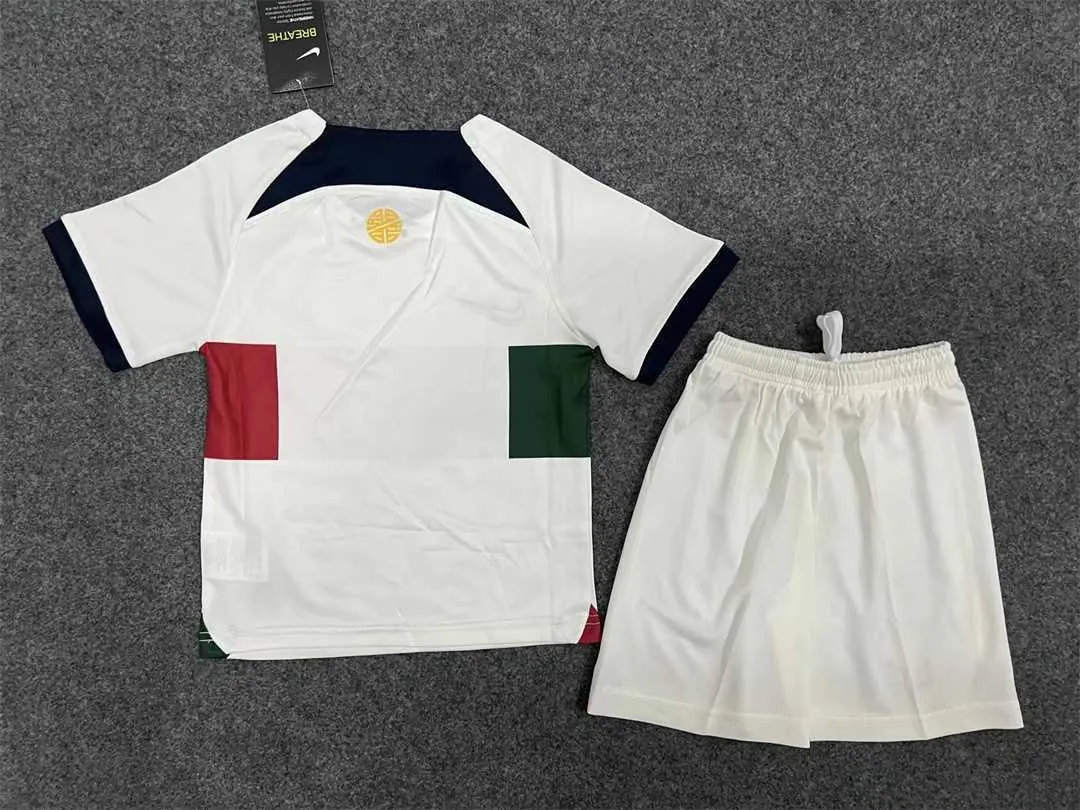 22-23 Portugal away kids kit 1