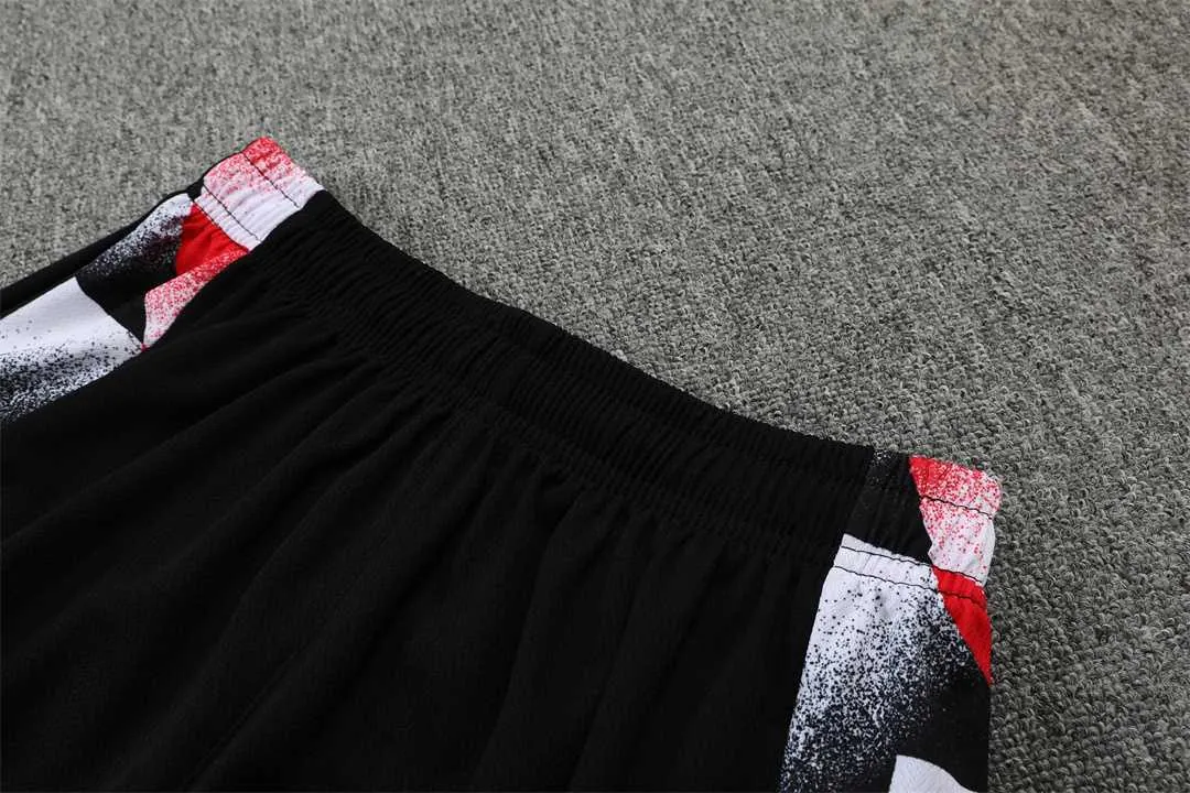 22-23 Manchester United training suit short sleeve kit red black and white color matching 1