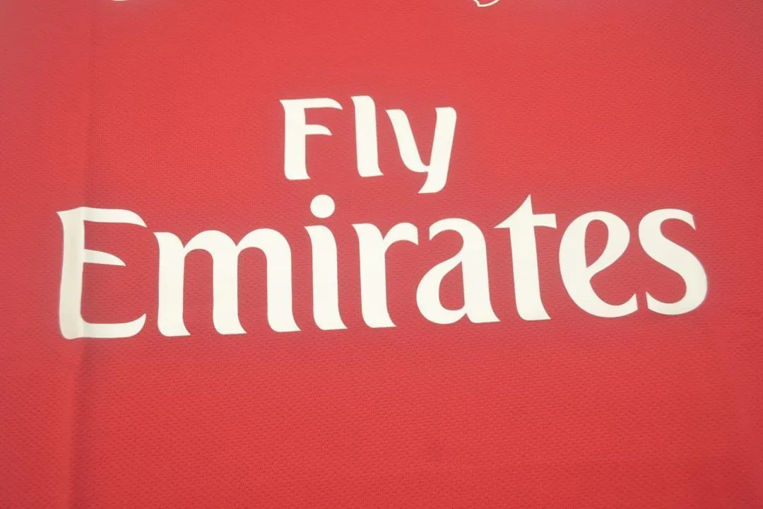11-12 Arsenal home UCL fonts 12