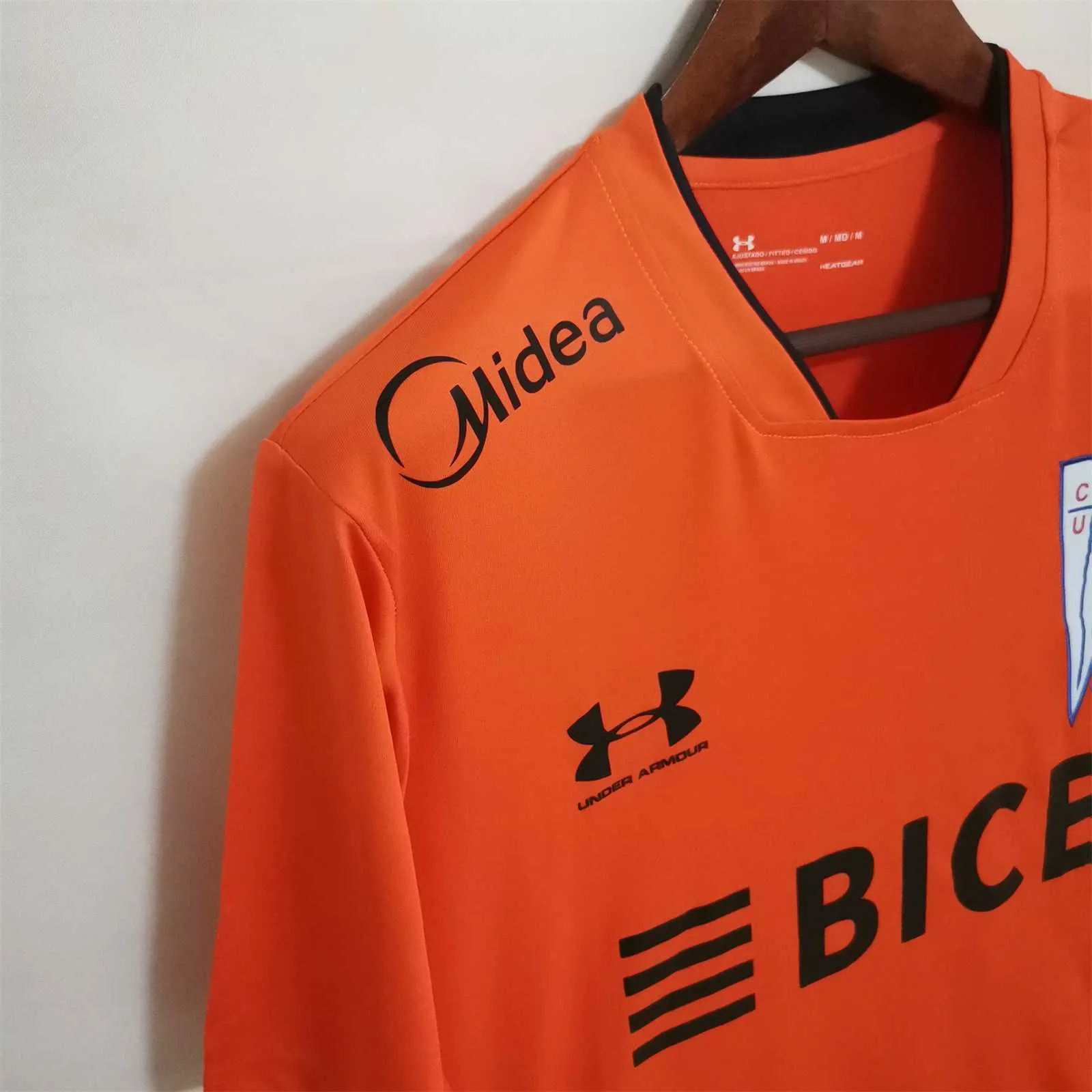 22-23 La Católica orange training suit 1