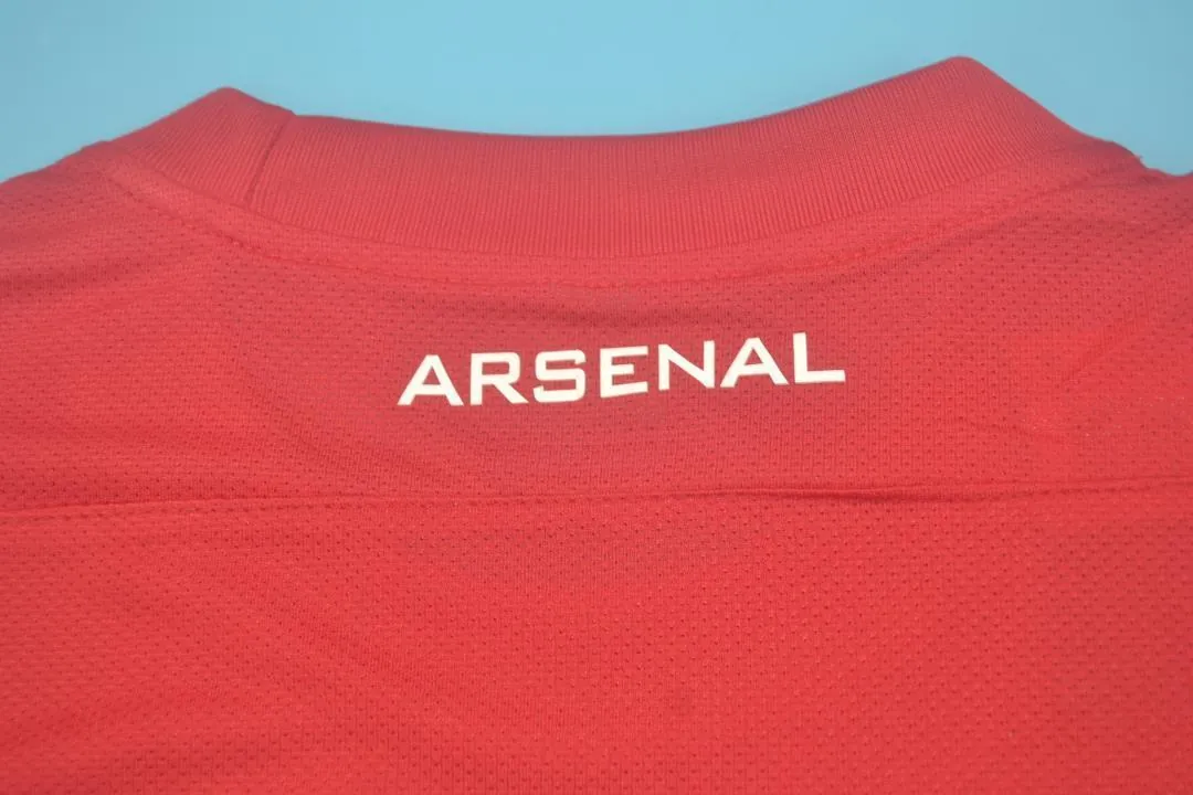 11-12 Arsenal home UCL fonts 7
