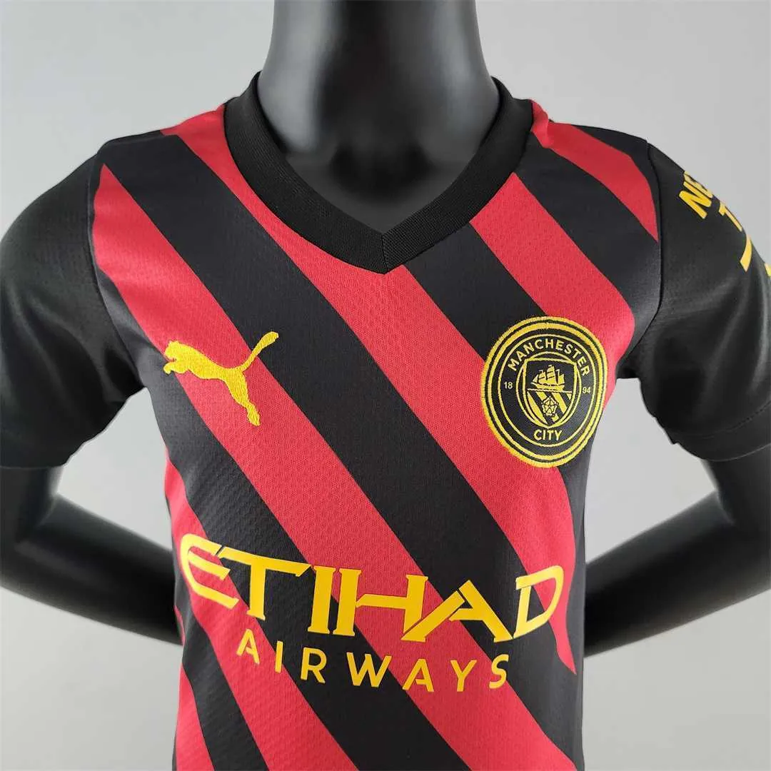 22-23 Manchester City away kids kit 3