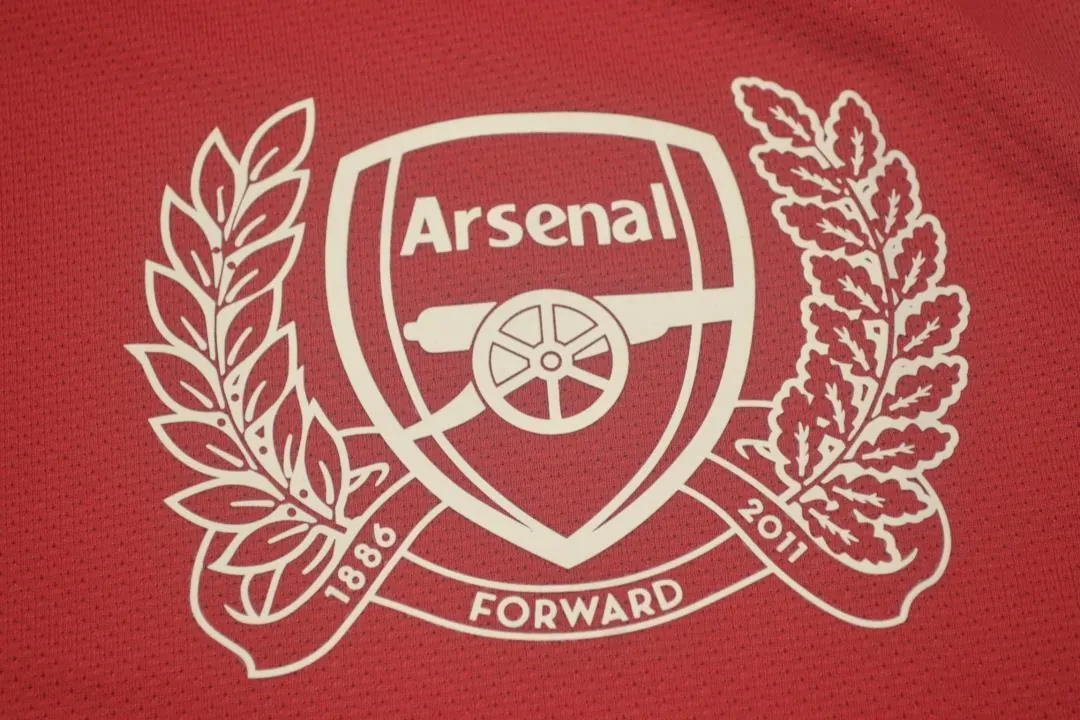 11-12 Arsenal home UCL fonts 3