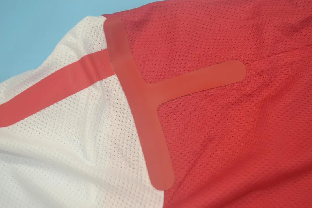 11-12 Arsenal home UCL fonts 5