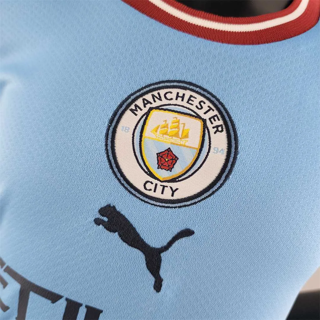 22-23 Manchester City home kids kit 1