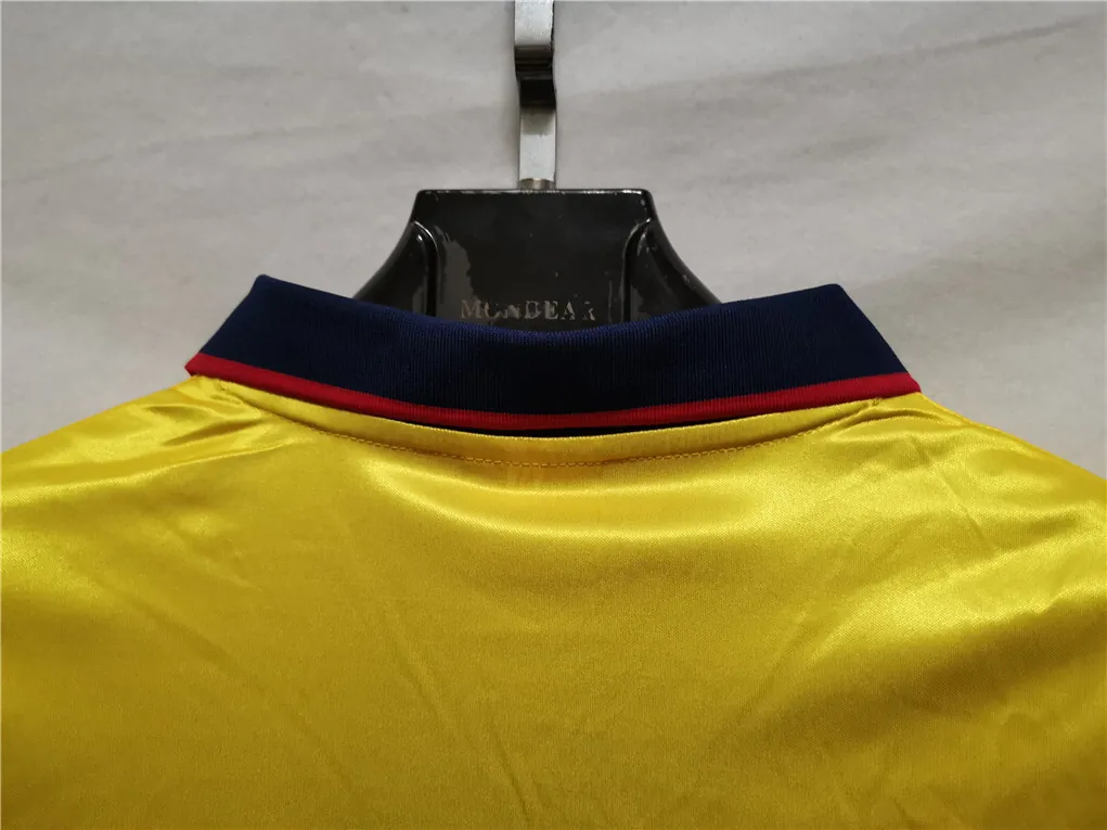 97-98 Arsenal away yellow 4