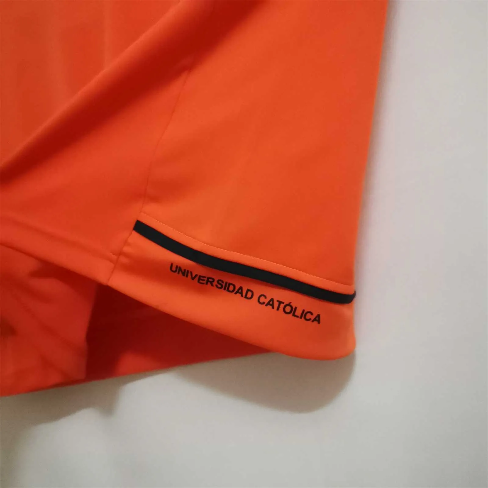 22-23 La Católica orange training suit 5