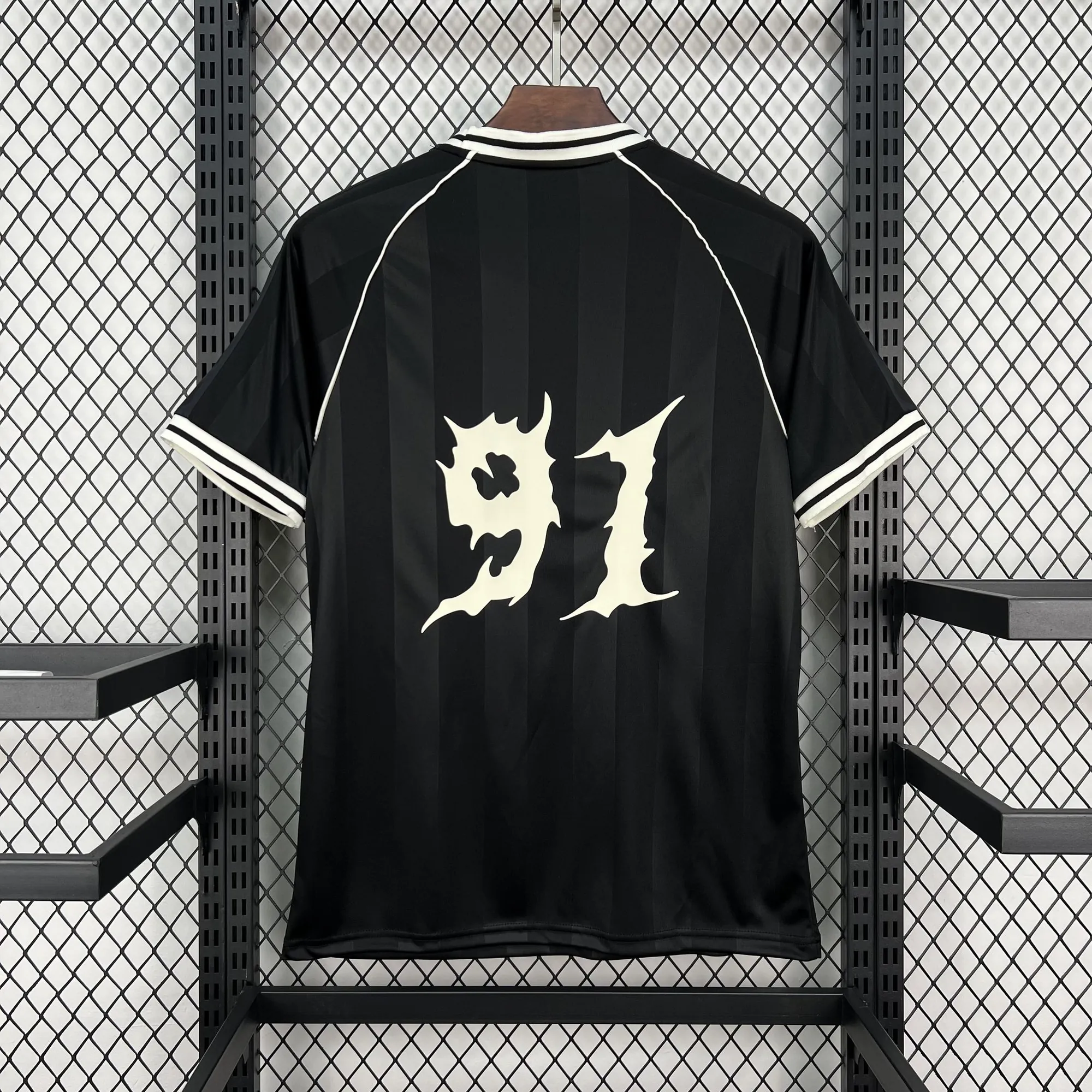 26-27 The Prodigy x Hummel Mens Black Soccer T-Shirt AAAAJersey Wholesale Yupoo 6 4