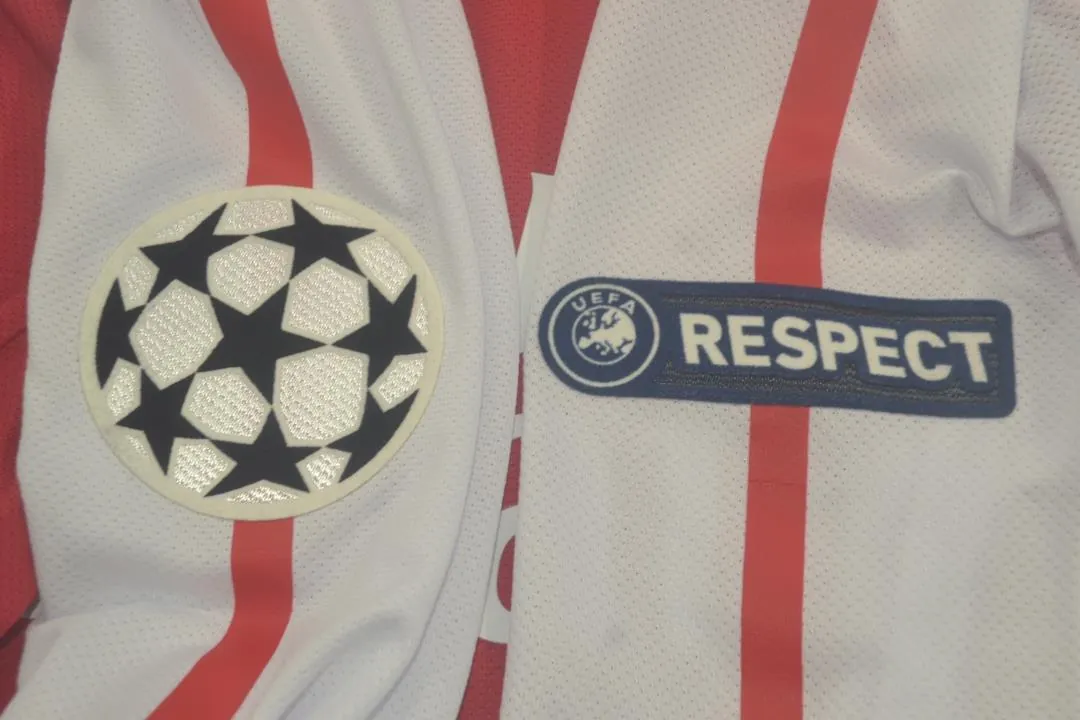 11-12 Arsenal home UCL fonts 4