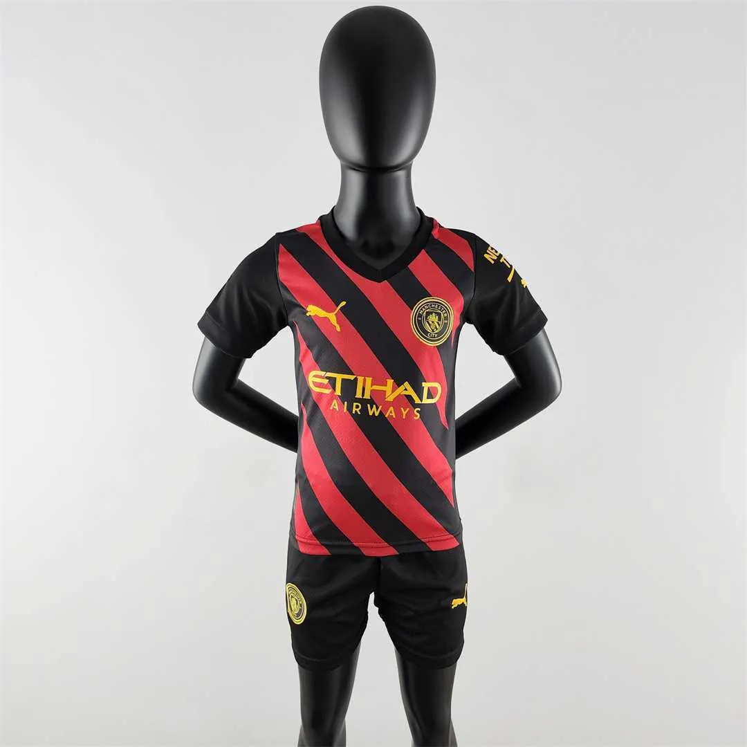 22-23 Manchester City away kids kit 11