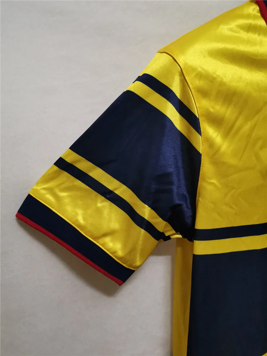 97-98 Arsenal away yellow 8