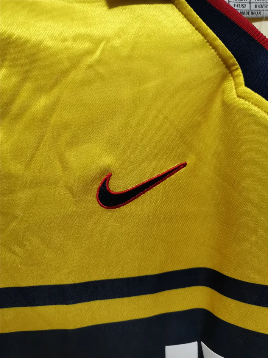 97-98 Arsenal away yellow 5