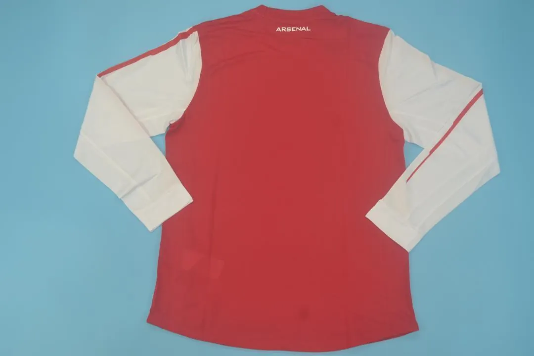 11-12 Arsenal home UCL fonts 2