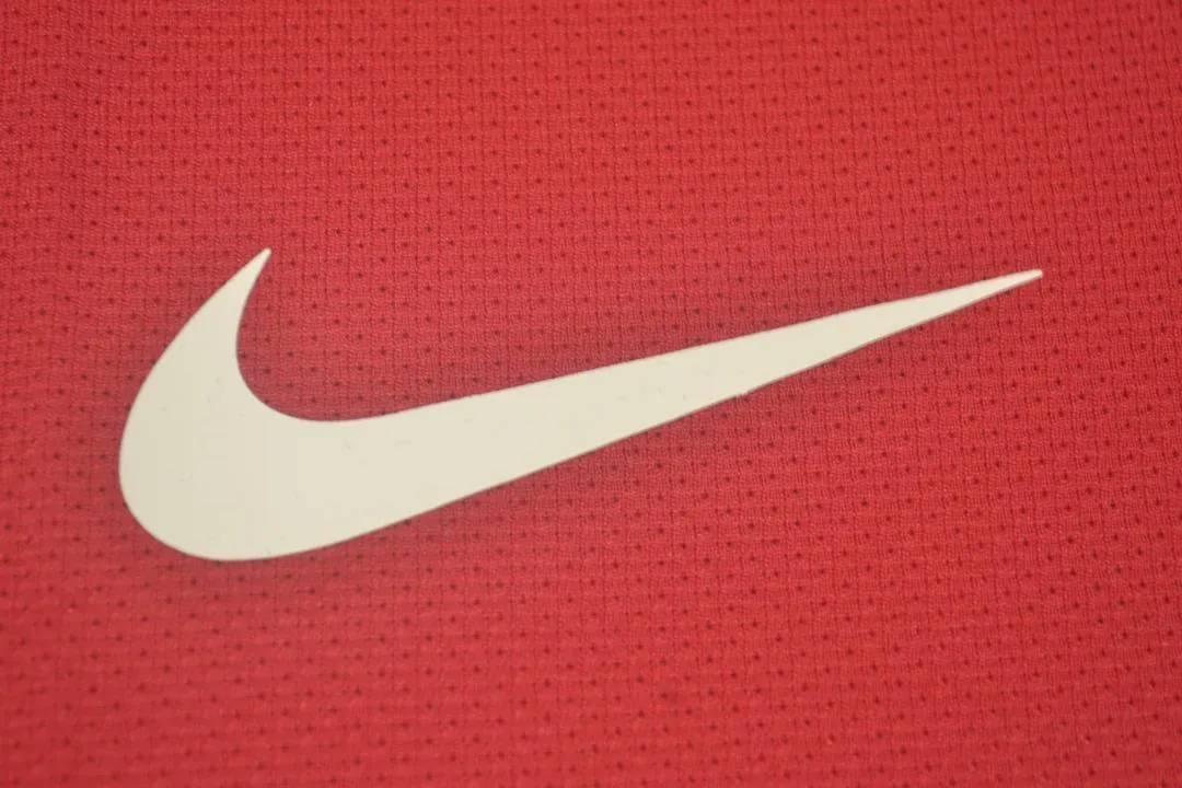 11-12 Arsenal home UCL fonts 1