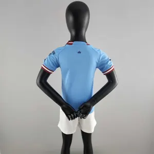 22-23 Manchester City home kids kit 4