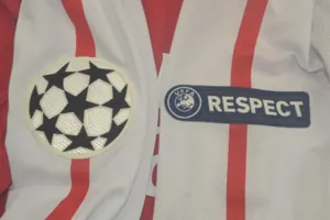 11-12 Arsenal home UCL fonts 4