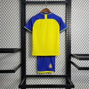 22-23 Saudi Al-Nassr home kids kit 6