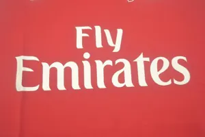 11-12 Arsenal home UCL fonts 12