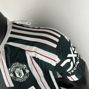 23-24 Manchester United away player version 1