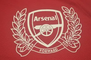 11-12 Arsenal home UCL fonts 3